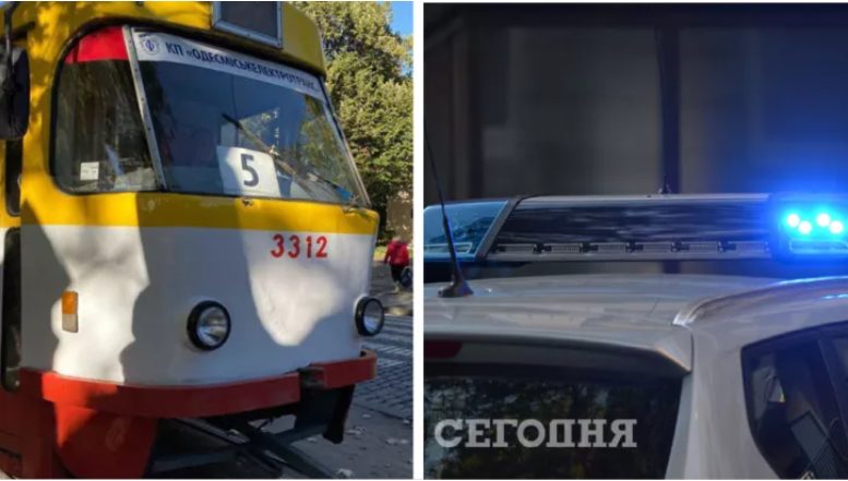 В Одессе пассажиры трамвая на руках перенесли полицейскую машину от рельсов (ФОТО)